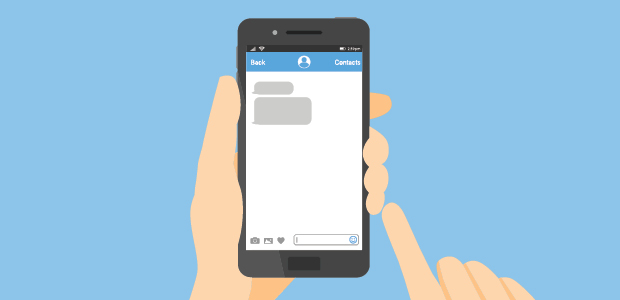 Person holding a mobile phone in their hand and pointing at the screen with their right index finger