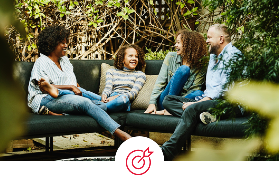 A family of four enjoys time outside together